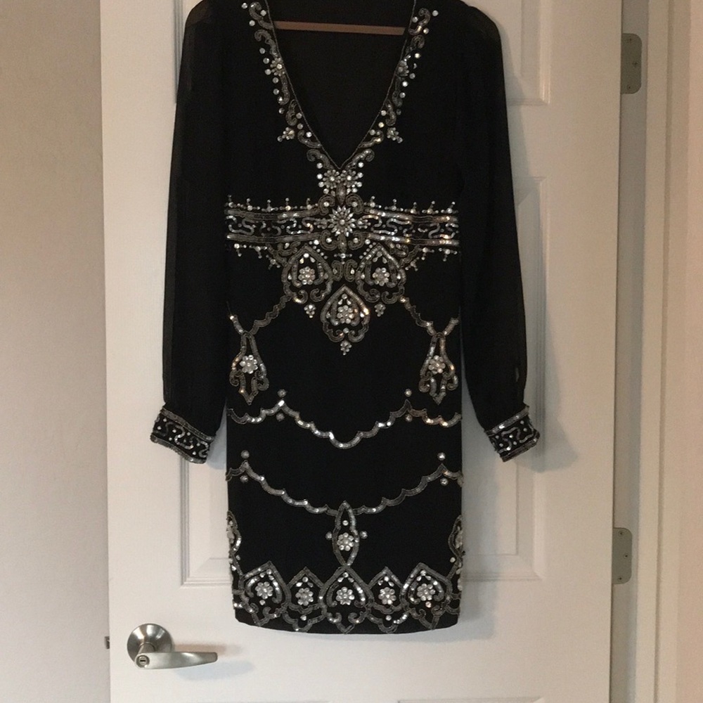 Black cocktail dress with bling.